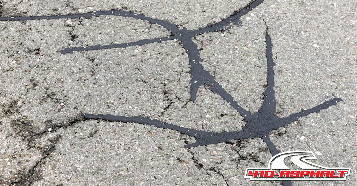 Does Sealcoating Fill Driveway Cracks